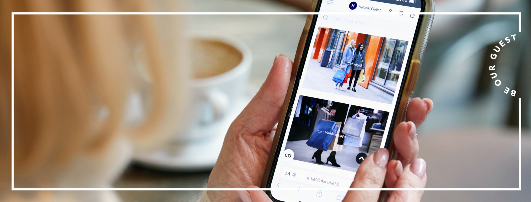 Consumer holds mobile phone