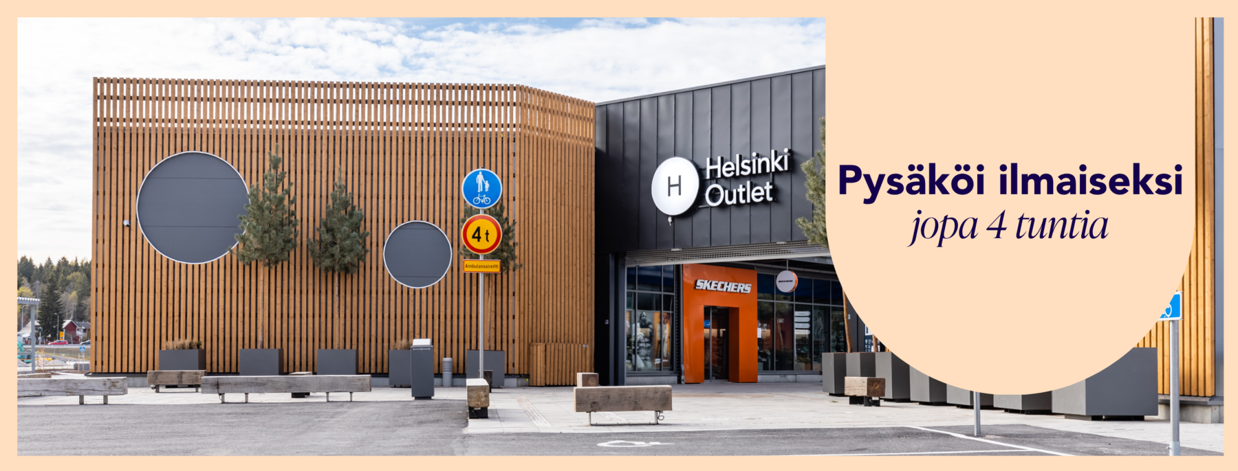 Ostoskylän sisäänkäynti ja parkkialue kuvattuna ylähäältä