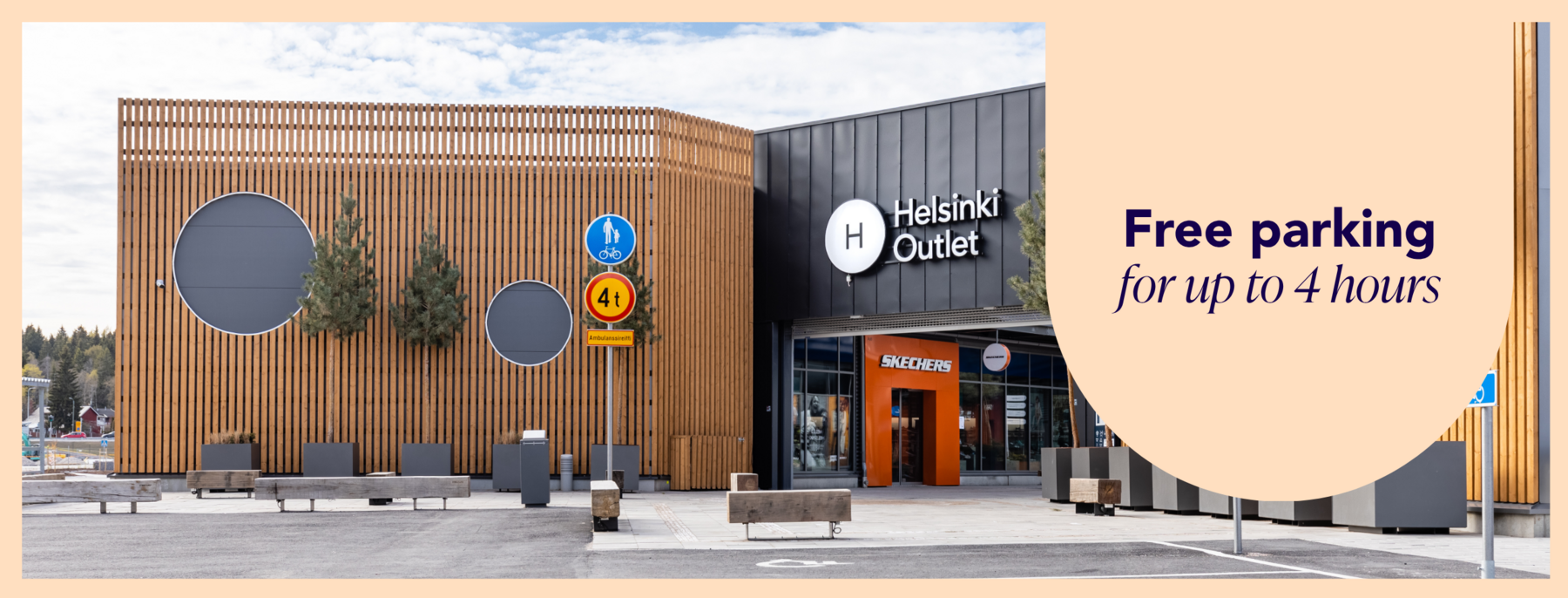 Entrance of the shopping village where the Skechers store is located
