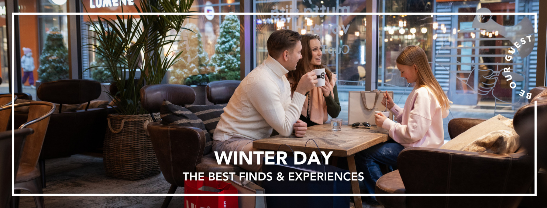 Parents and daughter having coffee at Espresso House, with brand store shopping bags in the picture.